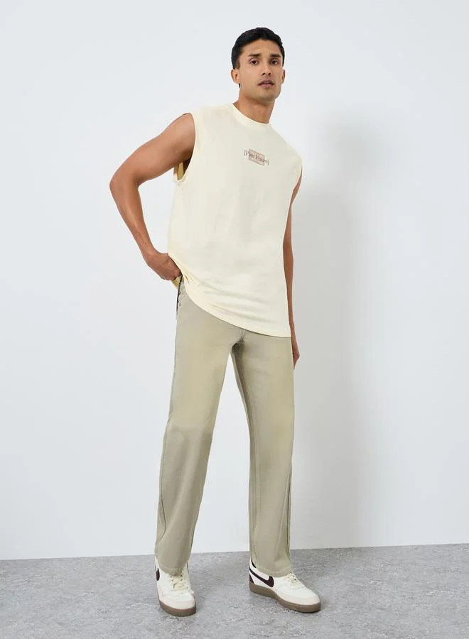 Men Beige Relaxed Fit Pleated Jeans